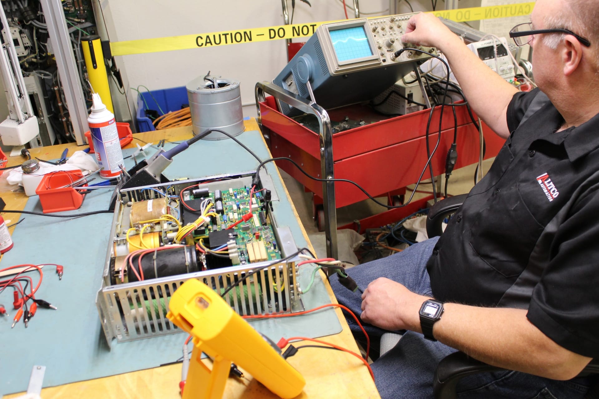 Litco Automation technician evaluating industrial motion-control equipment